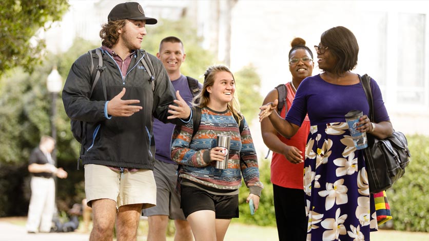 Group of LTSS students walking together on campus after class